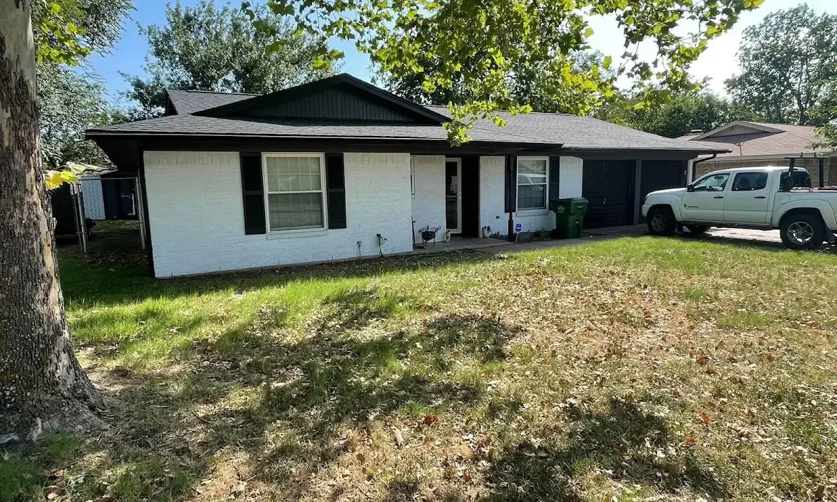 Professional roofing crew working on a residential roof in Hawaiian Gardens